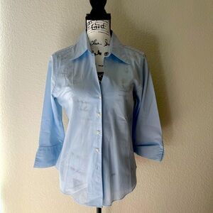 Marks and Spencer 
Light Blue Button-Up Shirt